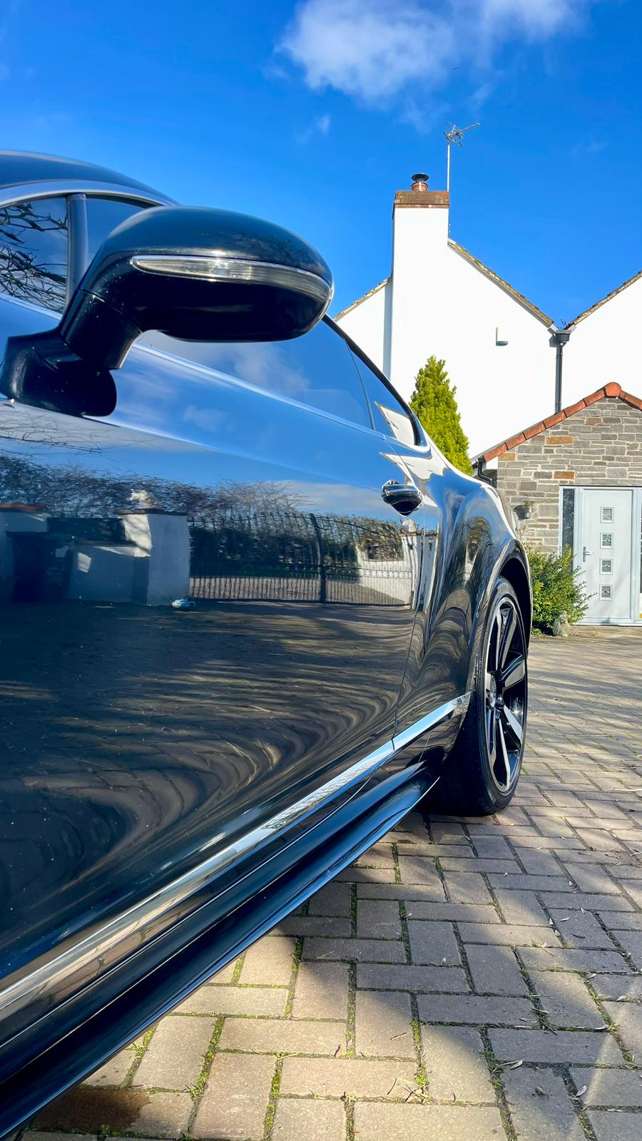 Bentley side profile detailed and ceramic coated at our Bristol detailing studio